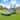 HeroKiddo Tropical Breeze 15 FT Dual Lane Inflatable Water Slide with Pool for Kids, Commercial-Grade PVC, Blower Included