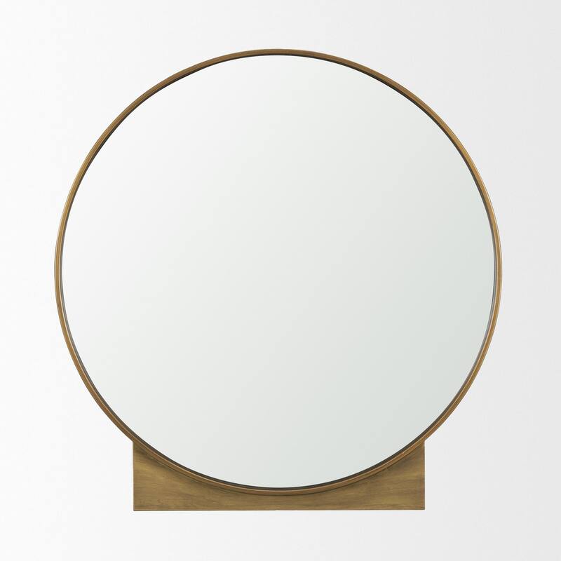 Tillie is a round mirror with a brushed gold metal frame. - 36.0L x 1.8W x 37.5H