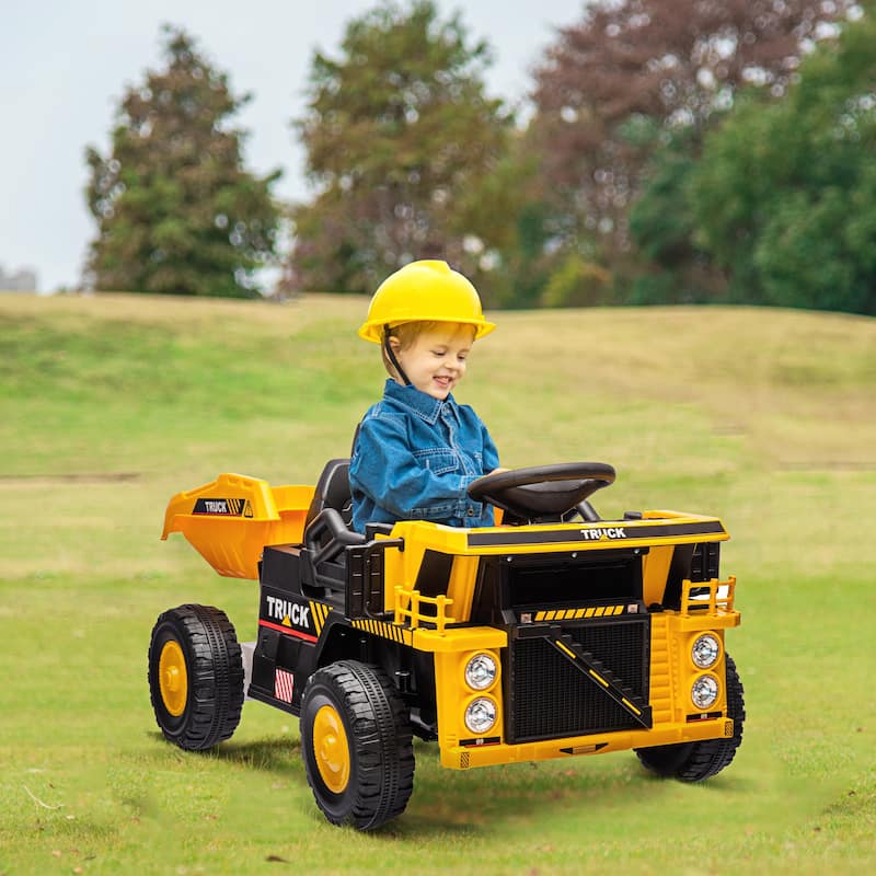 12V Kids Ride-On Dump Truck with Automatic Dump Bed, Spring Suspension, LED Headlights, Music Player, and Shovel - Yellow