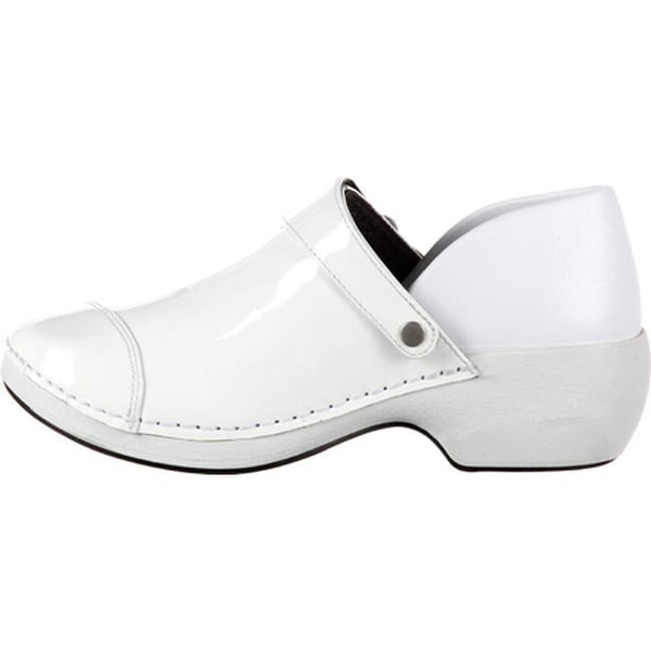white patent leather clogs