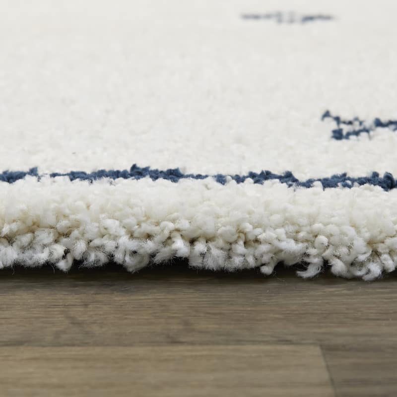 Eila Geometric Southwestern Shag Area Rug