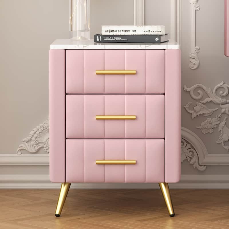 Upholstered Wooden Nightstand Featuring Three Drawers With Metal Legs And Handles.