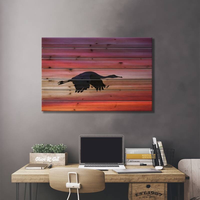 Sandhill Crane Silhouetted Flying At Sunset. Bosque Del Apache National Wildlife Refuge, New Mexico Print On Wood by Adam Jones
