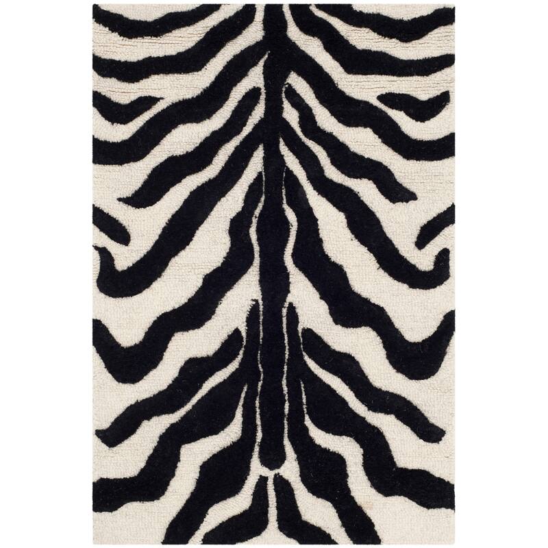 SAFAVIEH Handmade Cambridge Rikey Animal Print Wool Rug - 2' x 3' - Ivory/Black