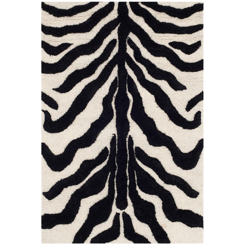 SAFAVIEH Handmade Cambridge Salina Animal Print Wool Rug - 2' x 3' - Ivory/Black