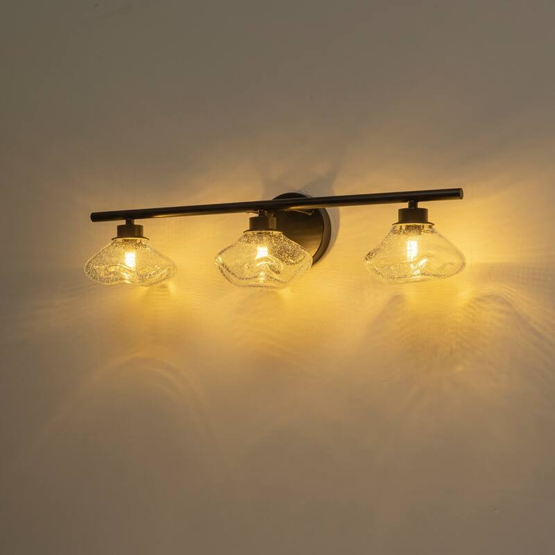 3-Light 24.4" Modern Black/Gold Bathroom Vanity Light with Stone-Shaped Seed Glass Shades