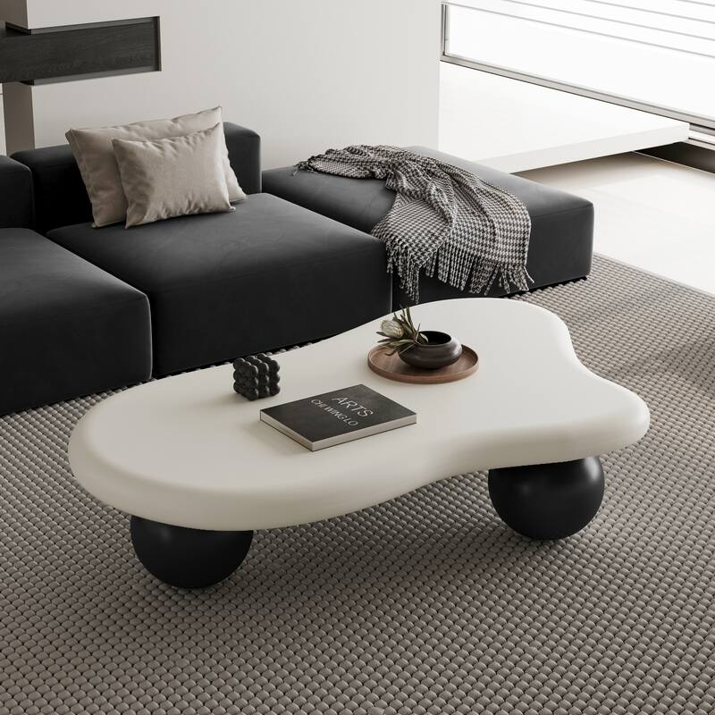 47 Inch Cloud Shaped Coffee Table with 3 Ball Legs for Living Room - Black White