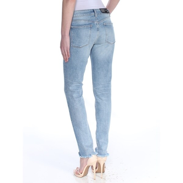 ladies light blue ripped jeans