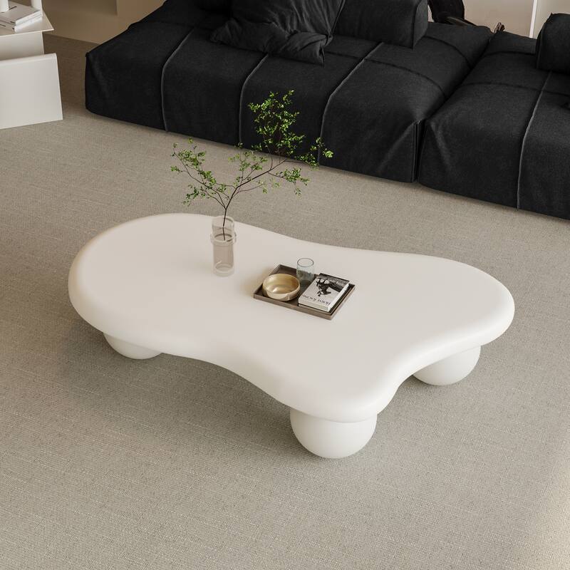 47 Inch Cloud Shaped Coffee Table with 3 Ball Legs for Living Room