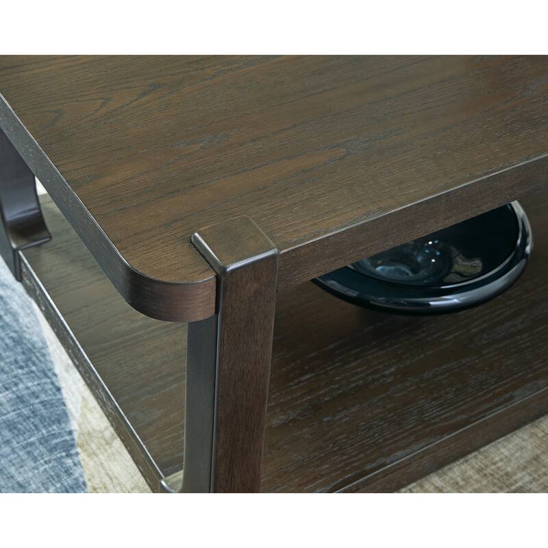 Signature Design by Ashley Breckington Brown Coffee Table - 50"W x 26"D x 18"H