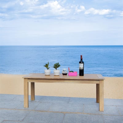 SAFAVIEH Couture Martinique Wood Patio Coffee Table. - 47"W x 26"D x 19"H