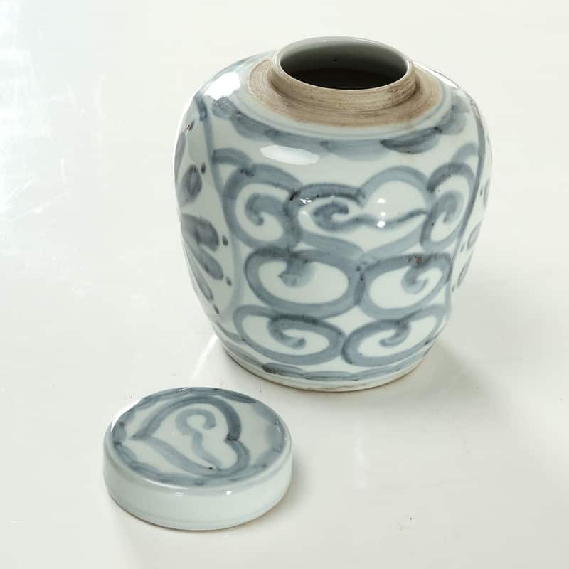 Approx.7 Inches Subtle Blue and White Round Jar with Floral Motif