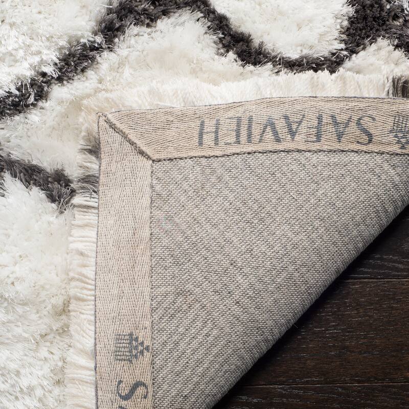 SAFAVIEH Handmade Toronto Shag Brittnay Polyester Rug