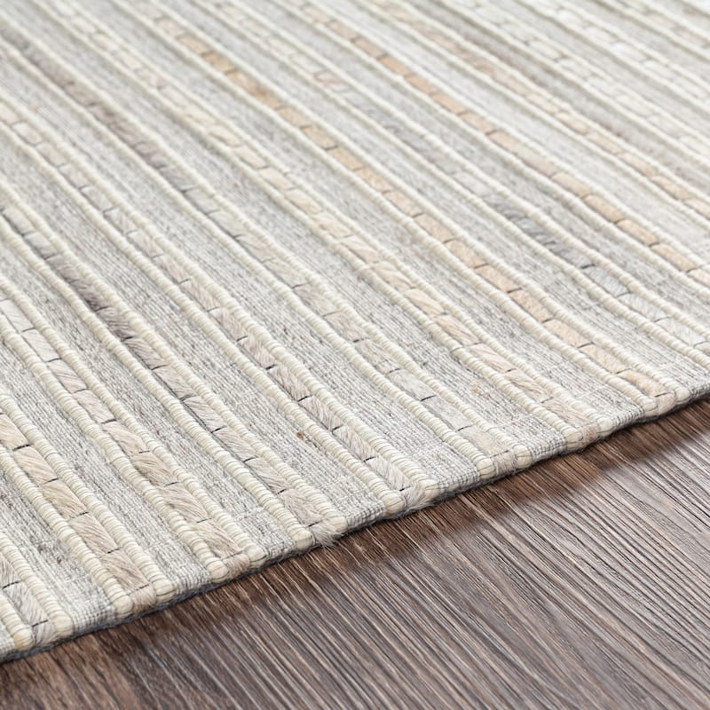 Coreen Handmade Modern Striped Hair on Hide Area Rug