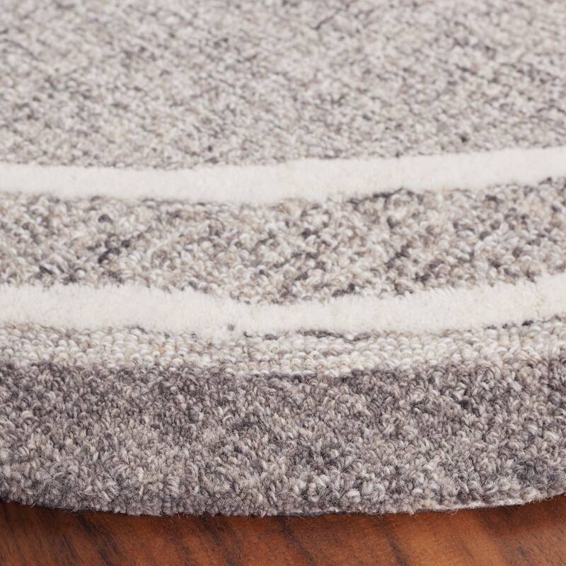 SAFAVIEH Handmade Ebony Gosselke Modern & Contemporary Wool Rug