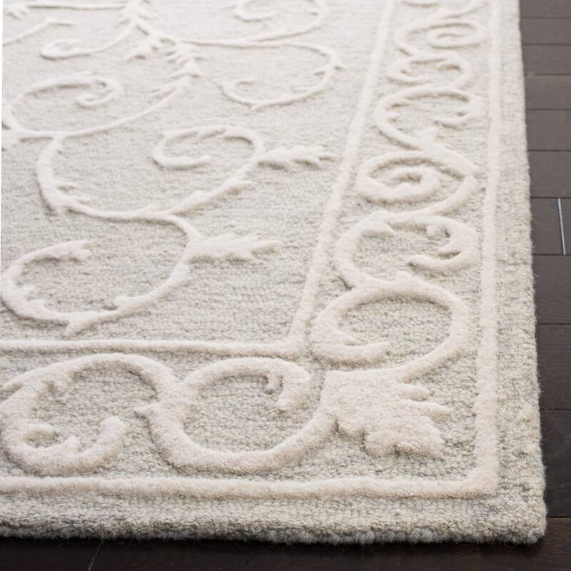 SAFAVIEH Handmade Micro-Loop Tomke Wool Rug