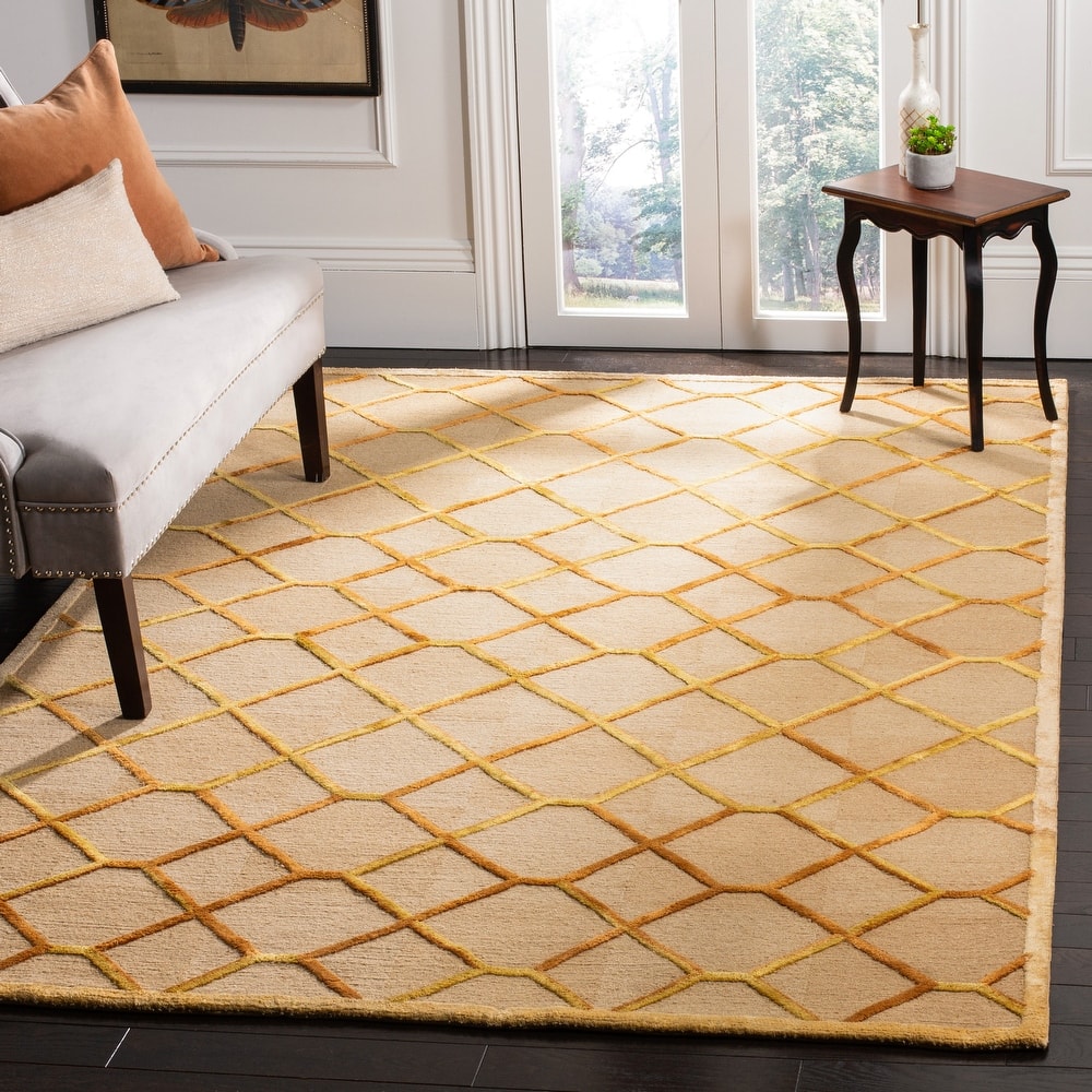SAFAVIEH Couture Hand-knotted Omera Modern Wool Rug