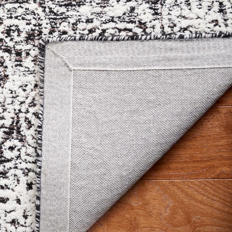 SAFAVIEH Handmade Ebony Satoko Medallion Wool Rug
