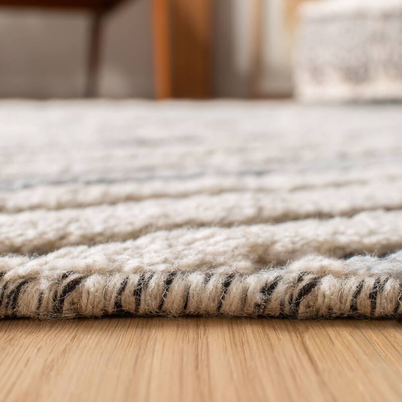 SAFAVIEH Hand-Knotted Casablanca Shag Aurane Tribal Wool Rug