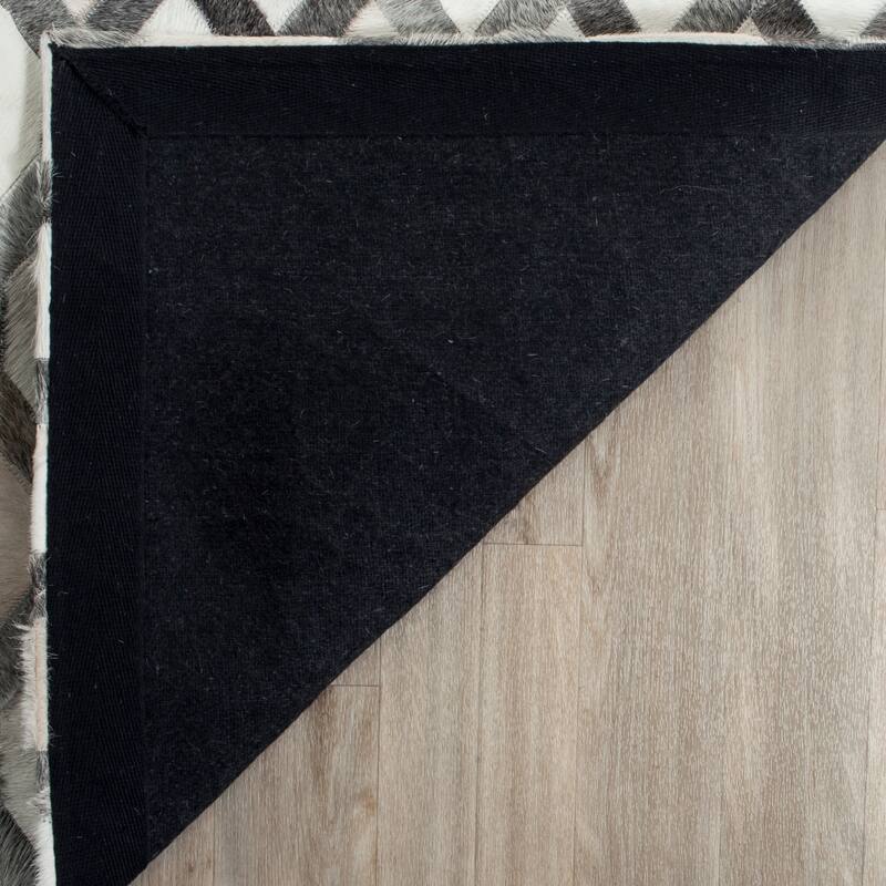 SAFAVIEH Handmade Studio Leather Tiana Modern Leather Rug