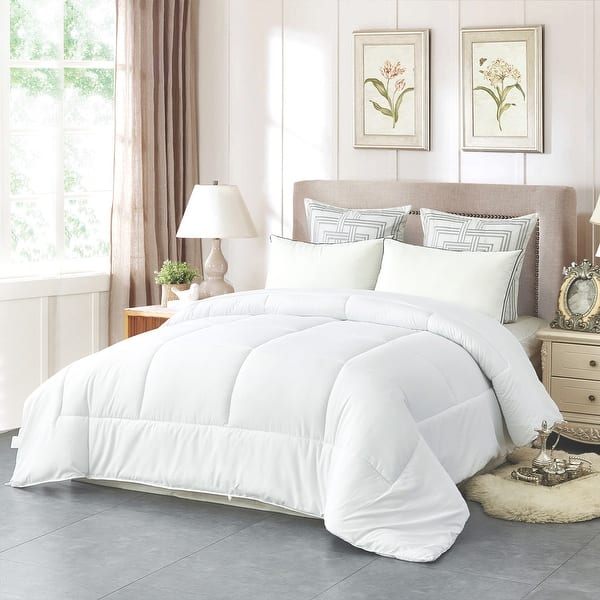 https://ak1.ostkcdn.com/images/products/is/images/direct/a6837fe39ec2703a44f7268c6b2f2a8772e90ecd/All-Season-Comforter-Soft-Quilted-Down-Alternative-Duvet-Insert-with-Corner-Tabs.jpg?impolicy=medium