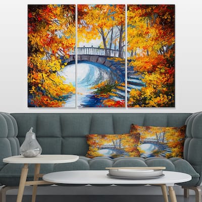 Designart "Fall Forest with a Bridge" Landscape Art Print Canvas - 36x28 - 3 Panels