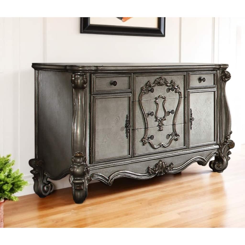 HomeRoots 70" Platinum Carved Scrollwork Wood And Polyresin Five Drawer Triple Dresser