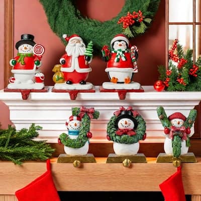 Glitzhome Resin Santa Snowman Penguin Gnomes with JOY Christmas Stocking Holders Mantel Ornament(Set of 3)