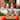 Glitzhome Resin Santa Snowman Penguin Gnomes with JOY Christmas Stocking Holders Mantel Ornament(Set of 3)