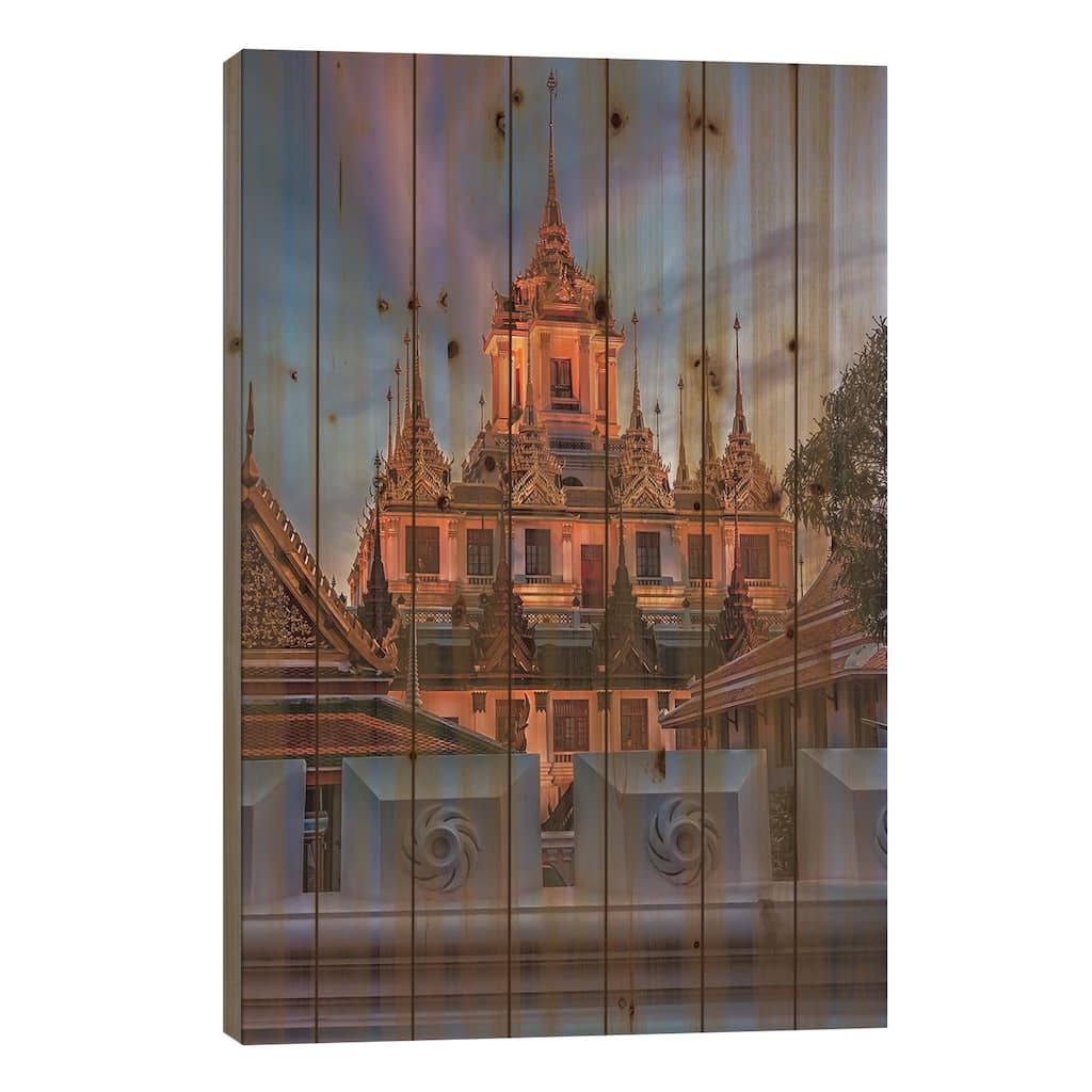 Thai Temple At Dusk Print On Wood by Manjik Pictures - Multi-Color