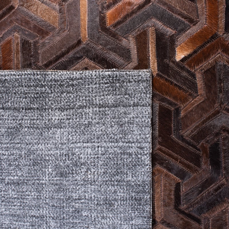 SAFAVIEH Handmade Studio Leather Kyla Modern Rug