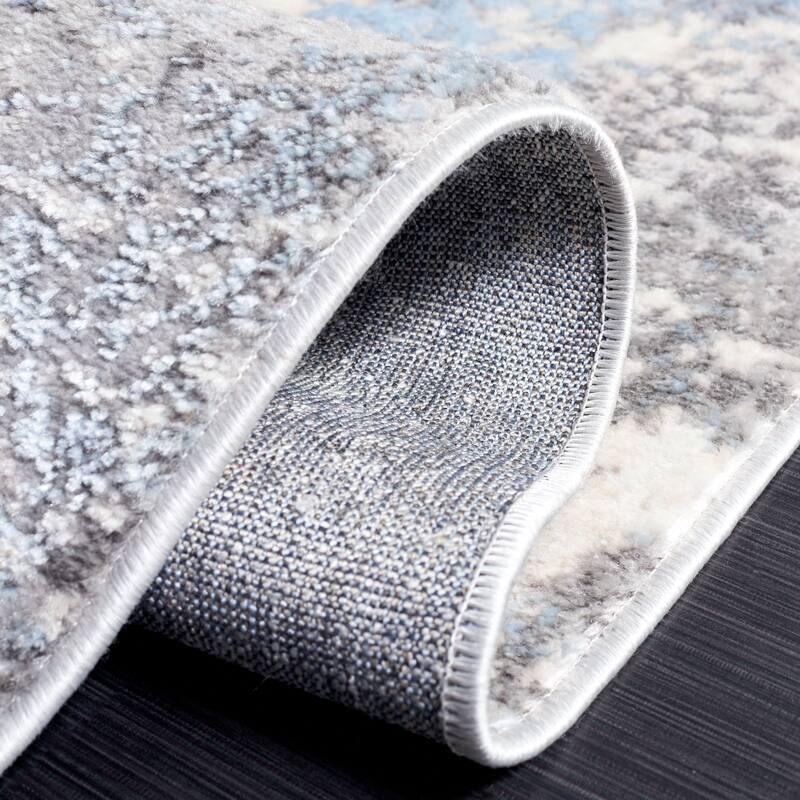 SAFAVIEH Lagoon Irmtraud Modern Abstract Polyester Area Rug