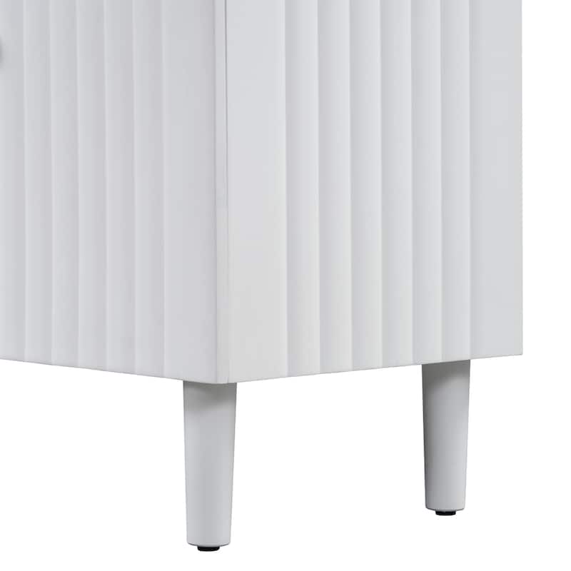 Elegant Four-Door Sideboard with Wavy Pattern Doors, Cylindrical Legs, and Sleek Metal Handles