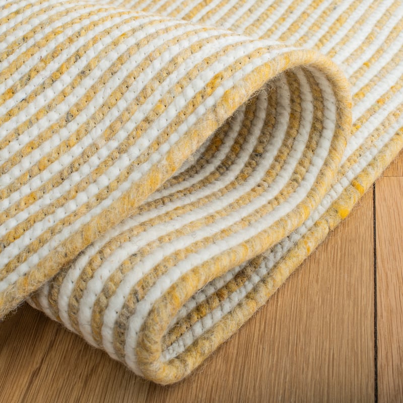 SAFAVIEH, Handmade Braided Bahrie Wool Rug