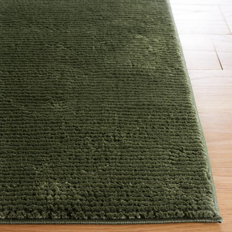 SAFAVIEH Revive Avie Solid Rug