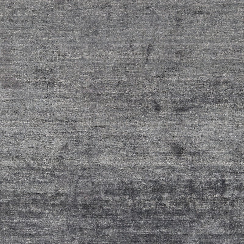 Hand-woven Dan Solid Viscose Area Rug