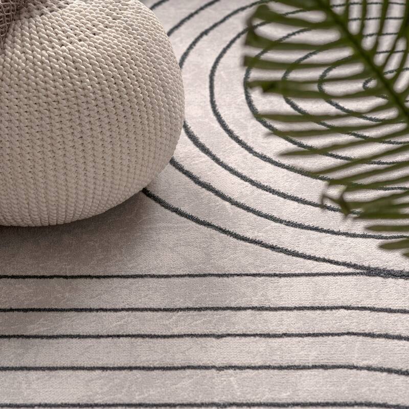 Elegant Area Rug with Carved Lines and Arch Pattern