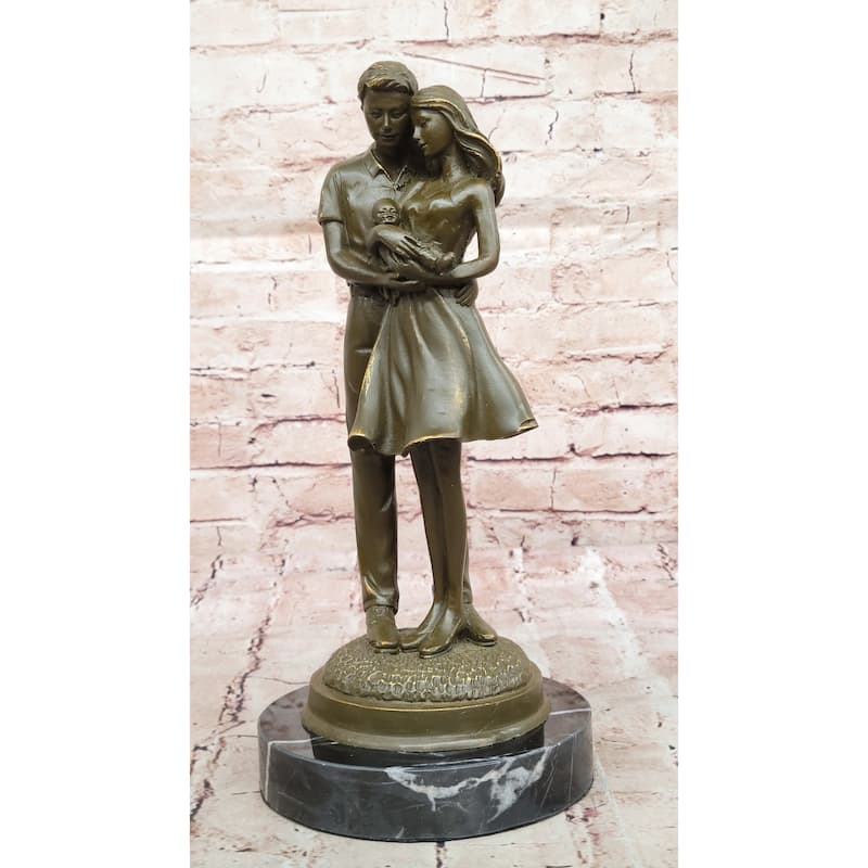 Bronze Sculpture Of Young Family Holding Newborn Baby By Milo