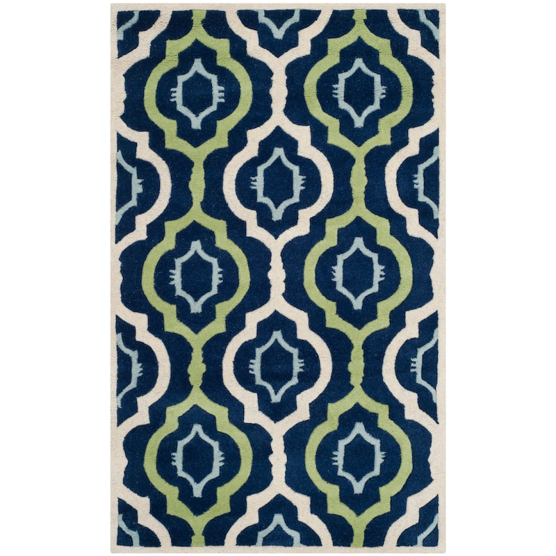 SAFAVIEH Handmade Chatham Vaka Modern Wool Rug