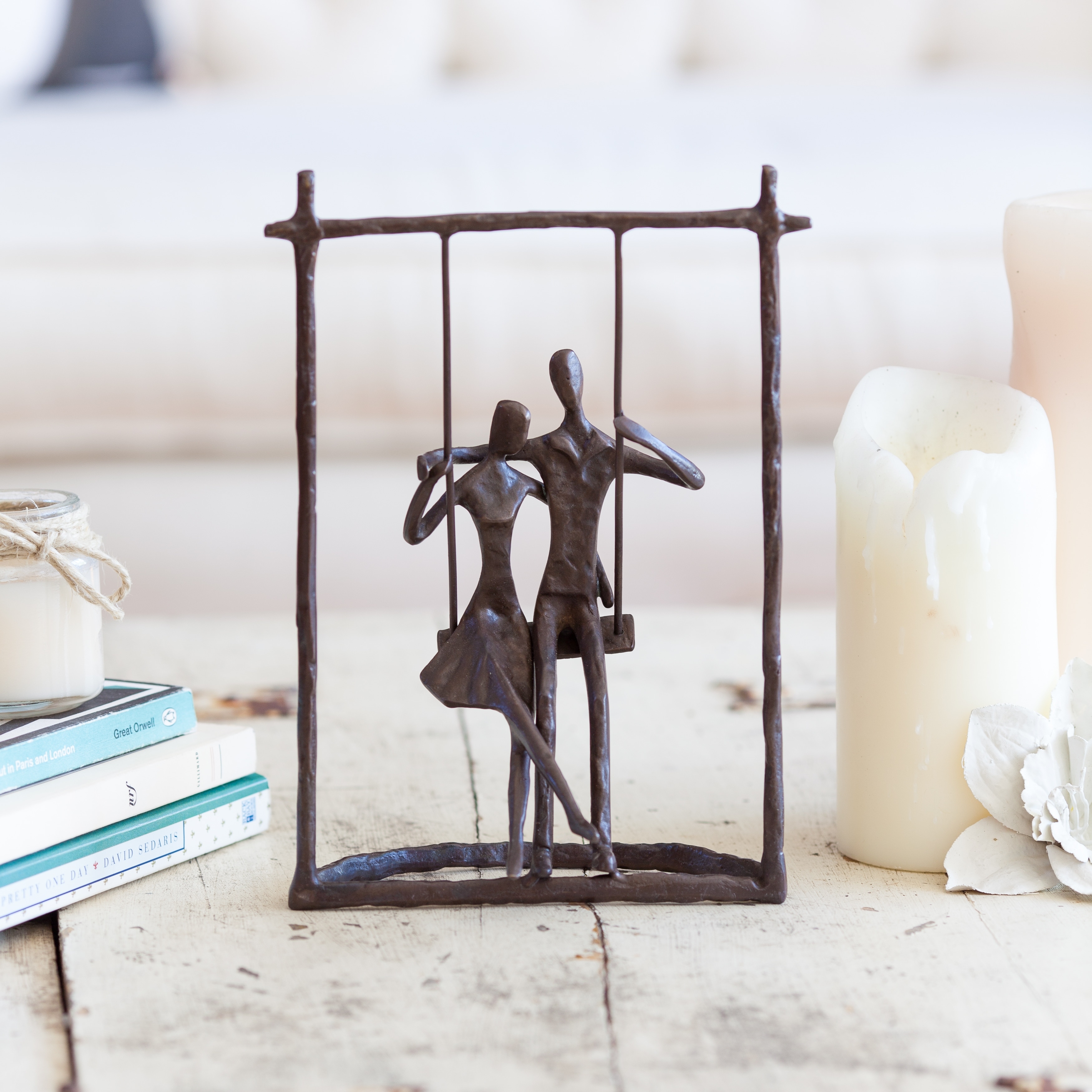 Couple on a Swing Bronze Sculpture