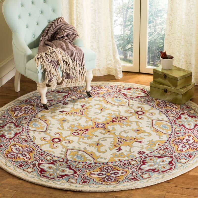 SAFAVIEH Handmade Heritage Wildfire Traditional Oriental Wool Rug - 6' Round - Ivory/Blue