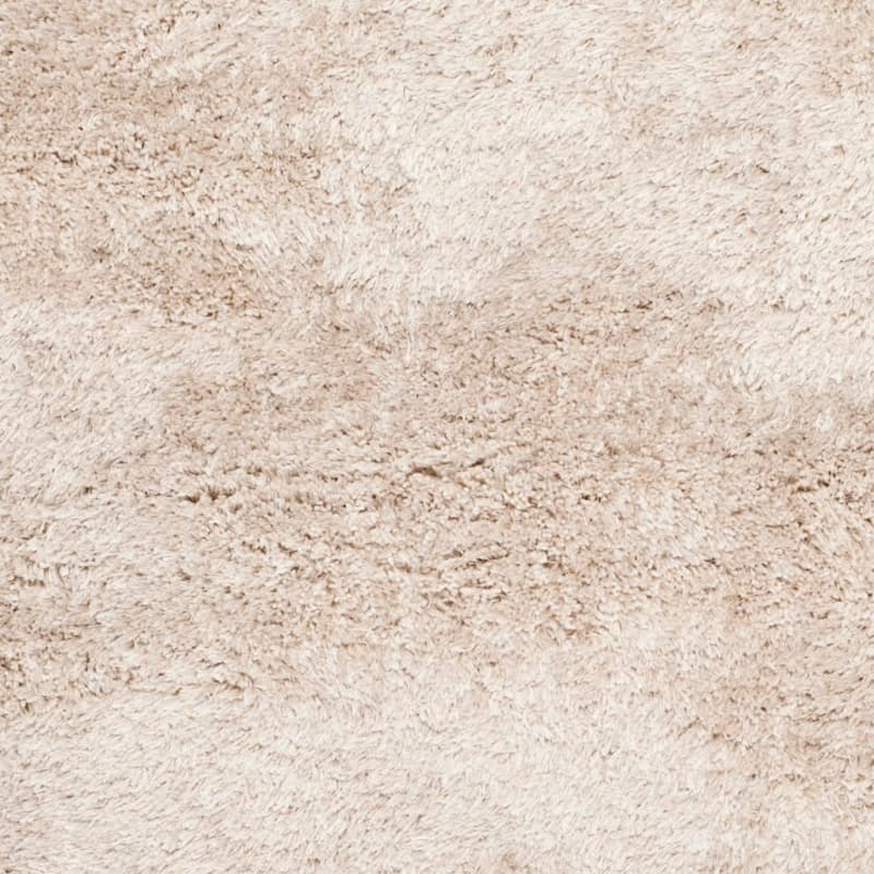 SAFAVIEH Handmade South Beach Leonella Shag Solid Polyester Rug