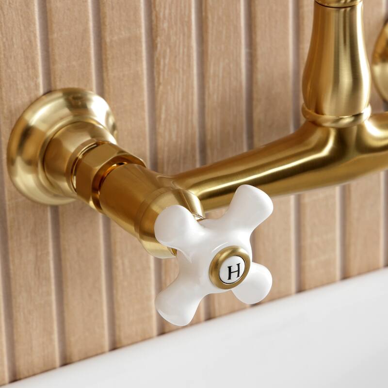 Kingston Brass English Country Two-Handle 2-Hole Wall Mount Bathroom Faucet