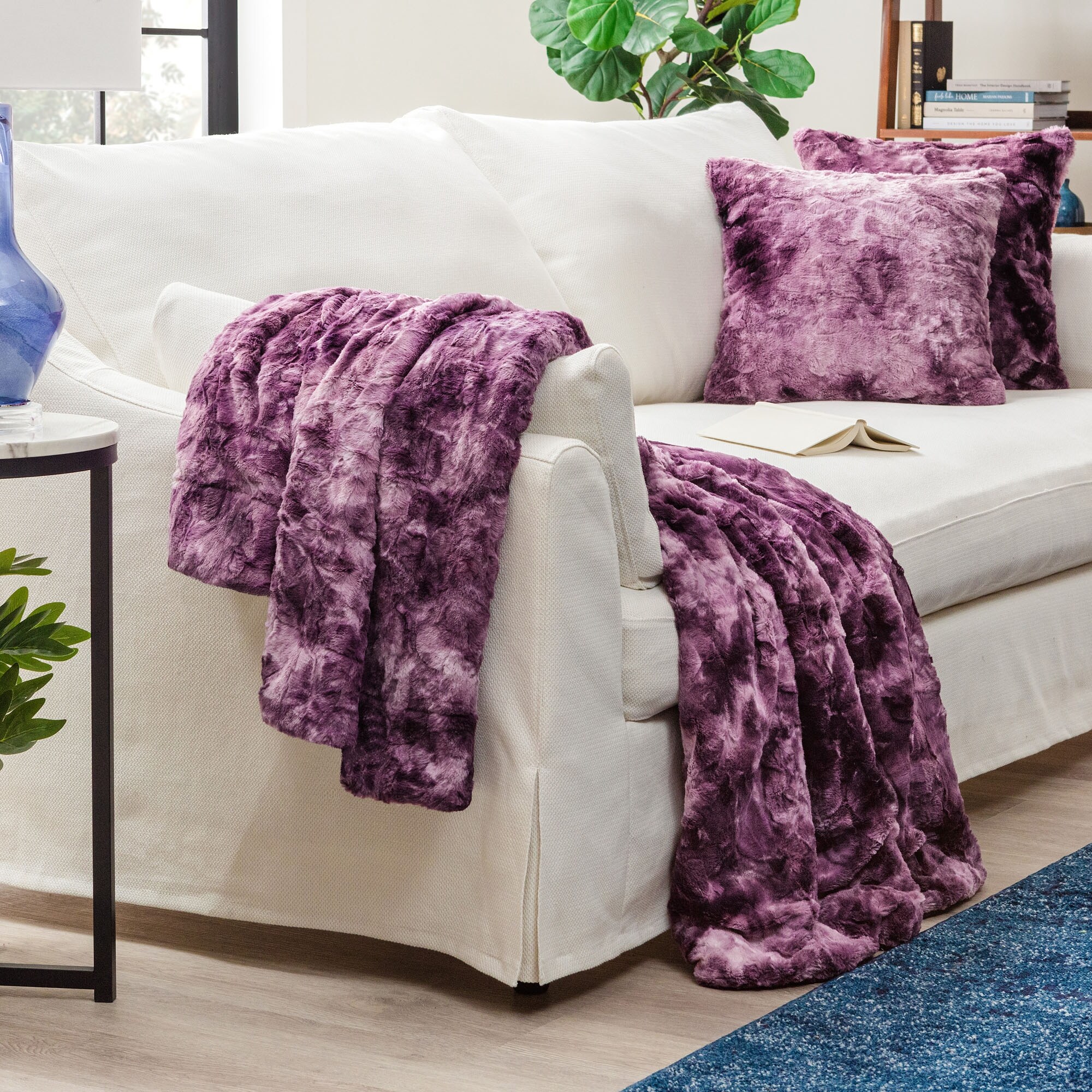 Fuzzy blankets and 2025 pillows