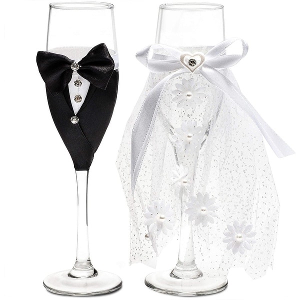 https://ak1.ostkcdn.com/images/products/is/images/direct/a872c8dbaa50547603168851ebcebecdc637fc67/Bride-and-Groom-Champagne-Flutes%2C-Wedding-Dress-Tuxedo-Toasting-Glasses-Gift-Set.jpg?impolicy=medium
