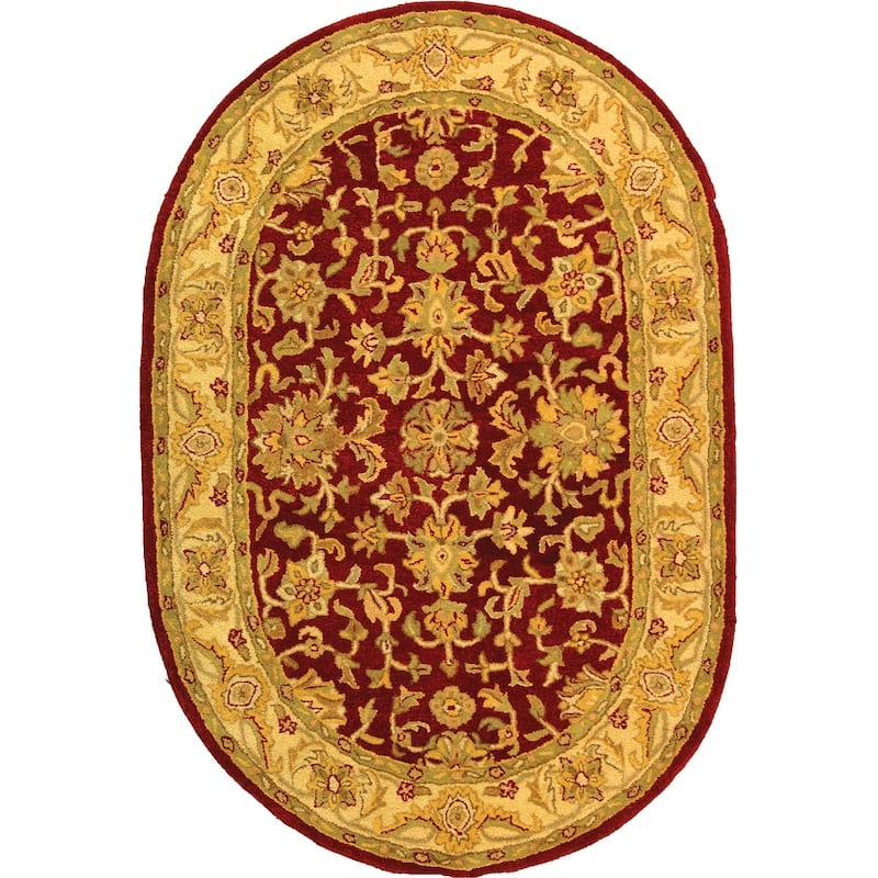 SAFAVIEH Handmade Antiquity Zelinda Traditional Oriental Wool Rug - 4'6" x 6'6" Oval - Red/Gold