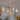4-Light Modern Gold Chandelier, Wavy Arm Pendant Light with Clear Glass Shades for Dining Room, Living Room - D23" x H12.5"