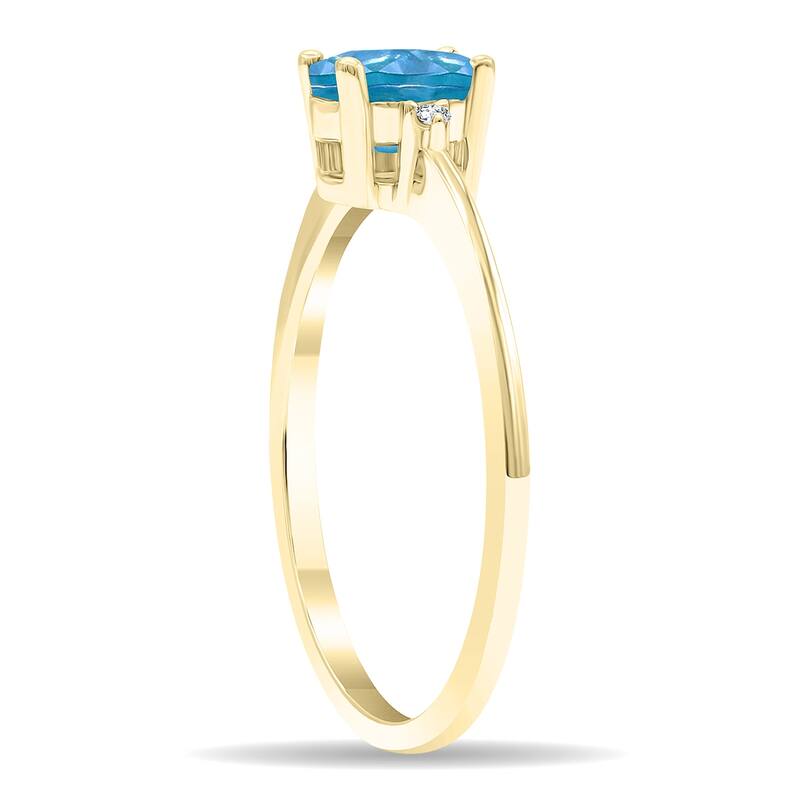 Women's Oval Shaped Blue Topaz and Diamond Classic Band in 10K Yellow Gold