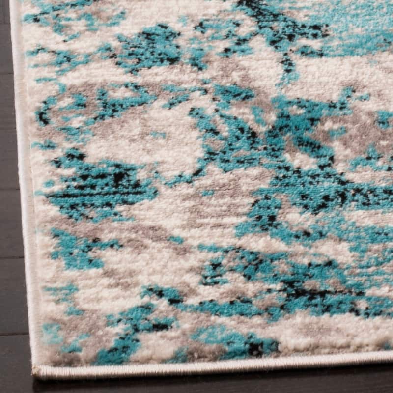 SAFAVIEH Skyler Nemesia Modern Rug - Blue/Ivory - 5' 1" x 7' 6"