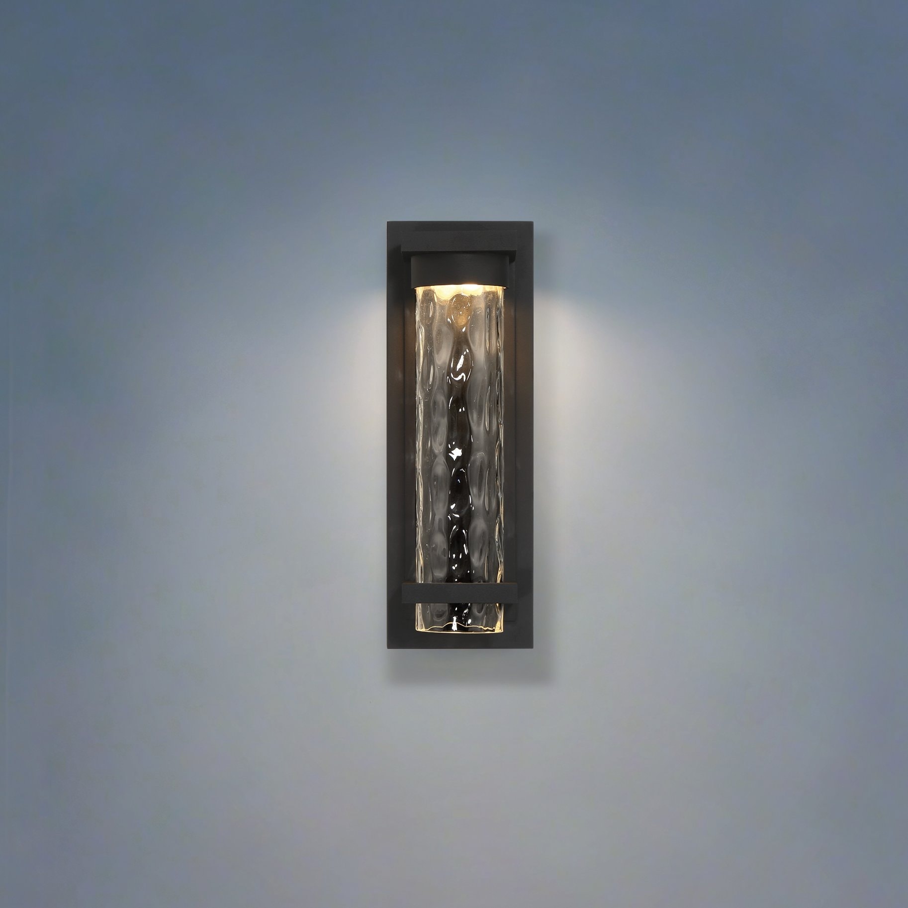 Thesis Lionel 14-inch Textured Black LED Exterior Wall Sconce with Clear Water Glass Shade